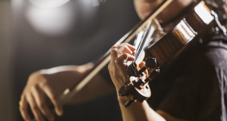 Violinist’s school bully asks her to play at wedding — she has perfect response