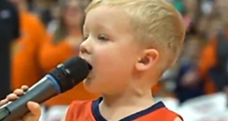 Brave toddler agrees to sing national anthem before crowd, only to have 6,000 people on their feet